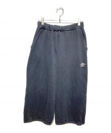 PUBLUX（パブリュクス）の古着「UMBRO別注 ロゴ刺繍裏起毛スウェット パンツ」｜ブラック