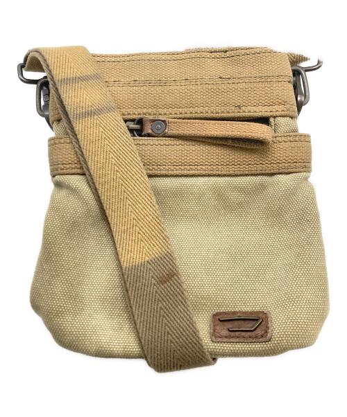 DIESEL（ディーゼル）DIESEL (ディーゼル) ユーズド加工キャンバスショルダーバッグ ベージュの古着・服飾アイテム