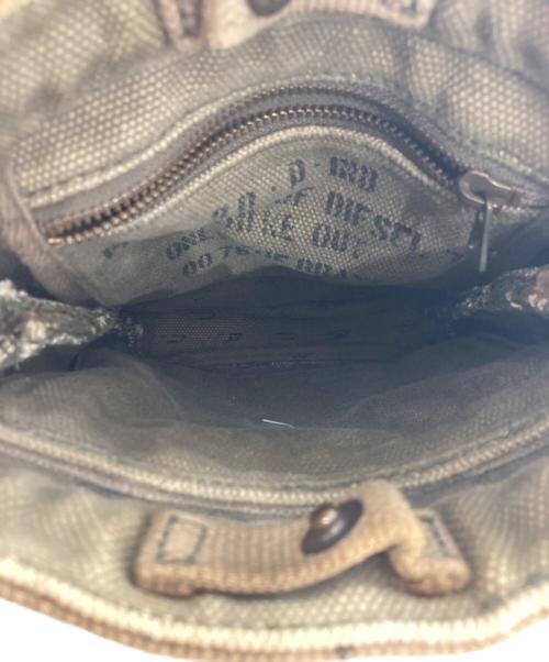 DIESEL（ディーゼル）DIESEL (ディーゼル) ユーズド加工キャンバスショルダーバッグ ベージュの古着・服飾アイテム