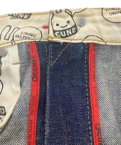 CUNE（キューン）CUNE (キューン) ２連うさぎ色落ち加工デニムパンツ インディゴ サイズ:34の古着・服飾アイテム