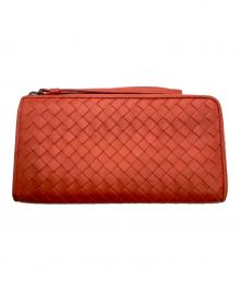 BOTTEGA VENETA（ボッテガベネタ）の古着「L字ファスナーイントレチャート長財布」｜オレンジ