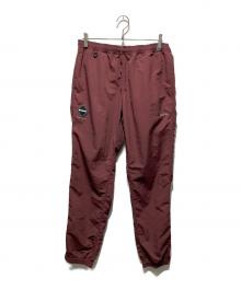 F.C.R.B.（エフシーレアルブリストル）の古着「NYLON EASY PANTS」｜バーガンディー