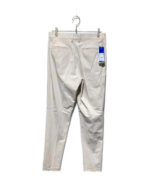 adidas（アディダス）adidas (アディダス) ツイストウィーブ 撥水 スリーストライプス アンクルパンツ ベージュ サイズ:79 未使用品の古着・服飾アイテム