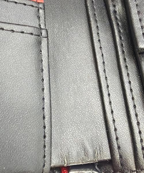 DIESEL（ディーゼル）DIESEL (ディーゼル) BIGロゴ2つ折り財布 レッドの古着・服飾アイテム