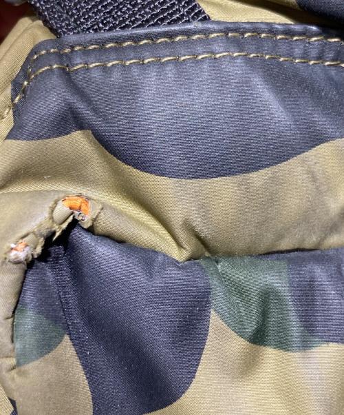 PORTER（ポーター）PORTER (ポーター) A BATHING APE (アベイシングエイプ) 1st CAMO RUCKSACK カーキの古着・服飾アイテム