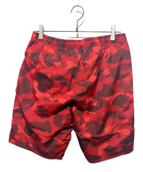A BATHING APE（アベイシングエイプ）A BATHING APE (アベイシングエイプ) Color Camo Shark Reversible Shorts/ハーフパンツ レッド サイズ:Ｌ 未使用品の古着・服飾アイテム