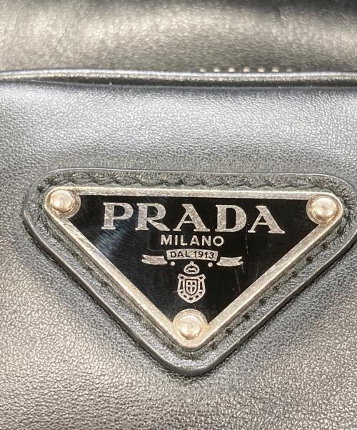 PRADA（プラダ）PRADA (プラダ) レザー スマートフォンケース ブラックの古着・服飾アイテム