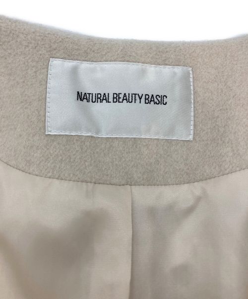 NATURAL BEAUTY BASIC（ナチュラルビューティーベーシック）NATURAL BEAUTY BASIC (ナチュラルビューティーベーシック) フェイクファースリーブペプラムコート ベージュ サイズ:SIZE Sの古着・服飾アイテム