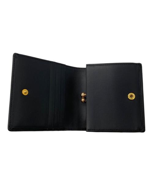 OMEGA（オメガ）OMEGA (オメガ) 2つ折り財布 ブラックの古着・服飾アイテム