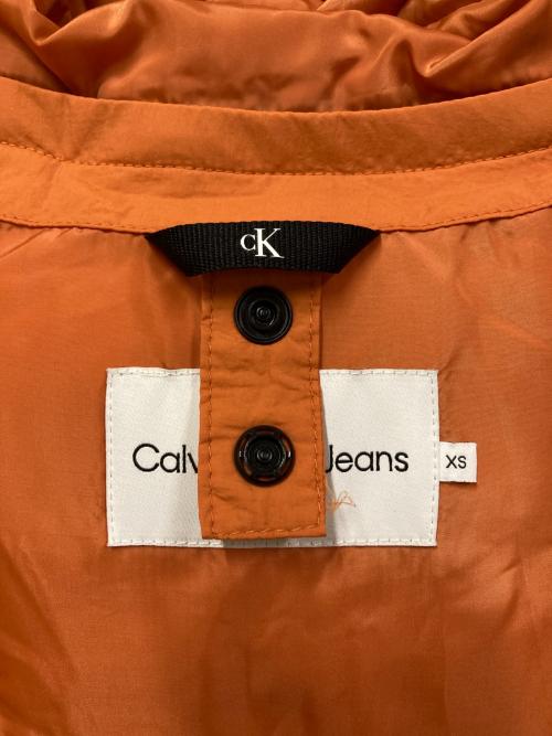 Calvin Klein Jeans（カルバンクラインジーンズ）Calvin Klein Jeans (カルバンクラインジーンズ) 中綿ベスト オレンジ サイズ:SIZE XSの古着・服飾アイテム