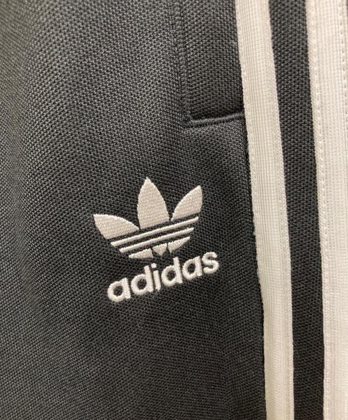 adidas（アディダス）adidas (アディダス) ADICOLOR BAGGY FIT FIREBIRD TRACK PANTS ブラック サイズ:SIZE Mの古着・服飾アイテム