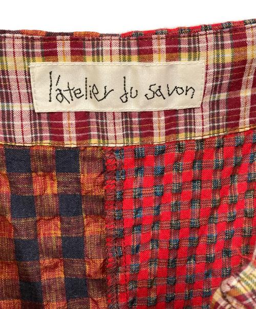 l'atelier du savon（アトリエドゥサボン）l'atelier du savon (アトリエドゥサボン) エプロンパッチワークワンピース レッド サイズ:SIZE Freeの古着・服飾アイテム