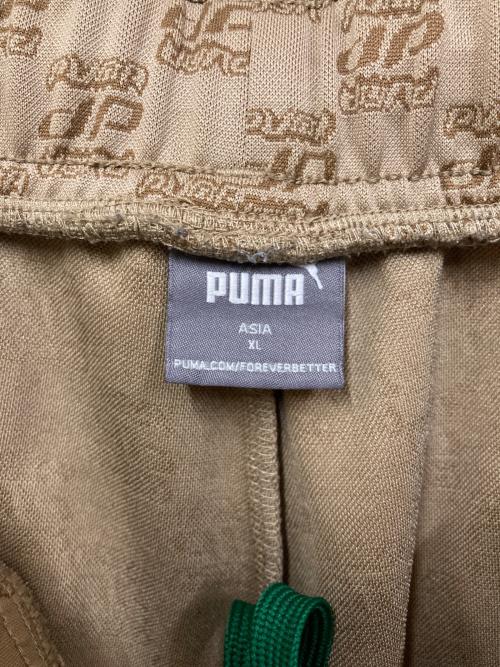 PUMA（プーマ）PUMA (プーマ) CORE HERITAGE モノグラム トラック パンツ ベージュ サイズ:SIZE XLの古着・服飾アイテム