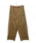 PUMA（プーマ）の古着「CORE HERITAGE モノグラム トラック パンツ」｜ベージュ