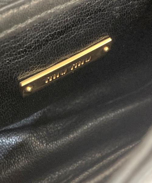 MIU MIU（ミュウミュウ）MIU MIU (ミュウミュウ) NAPPA BIKER COL/バイカー ショルダーバッグ ホワイト×ブラックの古着・服飾アイテム