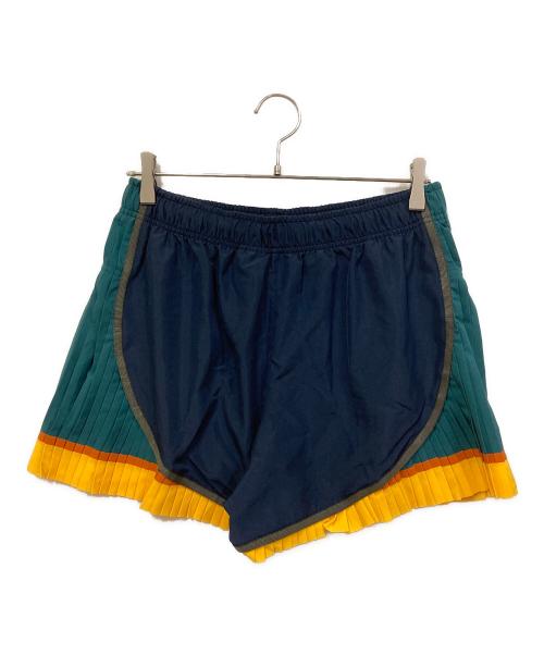 NIKE（ナイキ）NIKE (ナイキ) sacai (サカイ) PLEATED TEMPO SHORTS ネイビー サイズ:SIZE Mの古着・服飾アイテム
