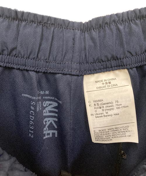 NIKE（ナイキ）NIKE (ナイキ) sacai (サカイ) PLEATED TEMPO SHORTS ネイビー サイズ:SIZE Mの古着・服飾アイテム