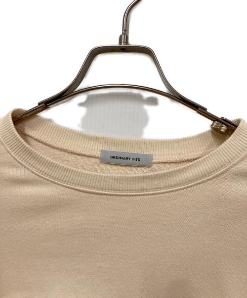 ordinary fits（オーディナリーフィッツ）Ordinary fits (オーディナリーフィッツ) 【FRENCH Bleu別注】ORDINARY FITS プリントスウェット アイボリーの古着・服飾アイテム