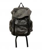 COACHコーチ）の古着「カモフラ柄ナイロンレザーバックパック」｜グレー