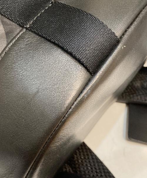 COACH（コーチ）COACH (コーチ) カモフラ柄ナイロンレザーバックパック グレーの古着・服飾アイテム