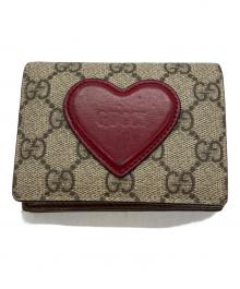 GUCCI（グッチ）の古着「ハートモチーフGG柄コンパクトウォレット」｜ブラウン