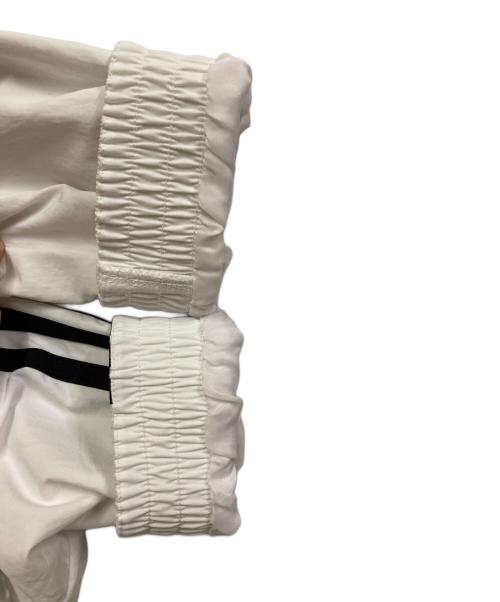 adidas（アディダス）adidas (アディダス) アディカラー ウーブン ファイヤーバード トラックトップ ホワイト×ブラック サイズ:XLの古着・服飾アイテム