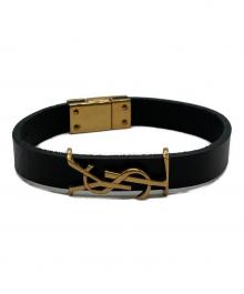 Saint Laurent Paris（サンローランパリ）の古着「オピウムロゴレザーブレスレット」｜ブラック×ゴールド
