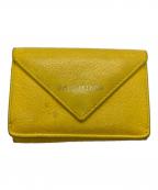 BALENCIAGAバレンシアガ）の古着「ペーパミニウォレット/3つ折り財布」｜イエロー