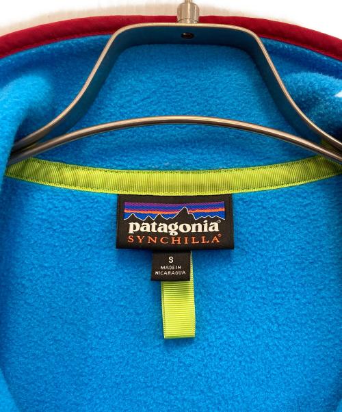 Patagonia（パタゴニア）Patagonia (パタゴニア) シンチラスナップT/フリースジャケット ターコイズブルー×エンジ サイズ:Sの古着・服飾アイテム