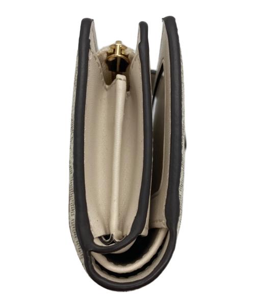 MICHAEL KORS（マイケルコース）MICHAEL KORS (マイケルコース) ビルフォールド MKシグネチャー ウォレット 二つ折り財布 ホワイトの古着・服飾アイテム