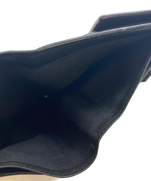 JIMMY CHOO（ジミーチュウ）JIMMY CHOO (ジミーチュウ) スタースタッズ2つ折り財布 ブラックの古着・服飾アイテム