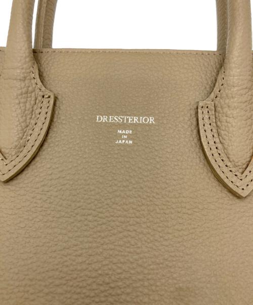DRESSTERIOR（ドレステリア）DRESSTERIOR (ドレステリア) スクエアレザートートバッグ アイボリーの古着・服飾アイテム