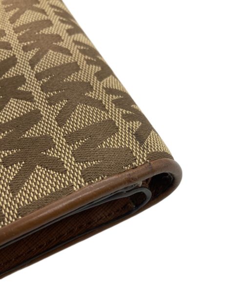 MICHAEL KORS（マイケル・コース）MICHAEL KORS (マイケルコース) 2つ折り財布 ベージュの古着・服飾アイテム