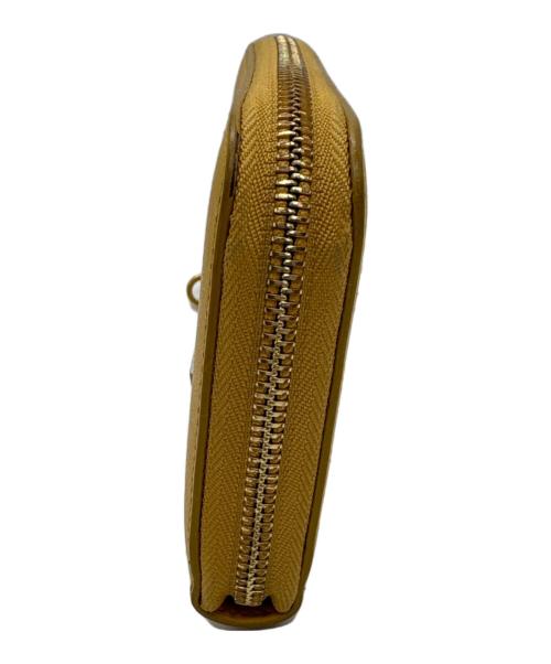 Salvatore Ferragamo（サルヴァトーレ フェラガモ）Salvatore Ferragamo (サルヴァトーレ フェラガモ) ガンチーニラウンド長財布 イエローの古着・服飾アイテム