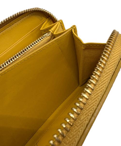 Salvatore Ferragamo（サルヴァトーレ フェラガモ）Salvatore Ferragamo (サルヴァトーレ フェラガモ) ガンチーニラウンド長財布 イエローの古着・服飾アイテム