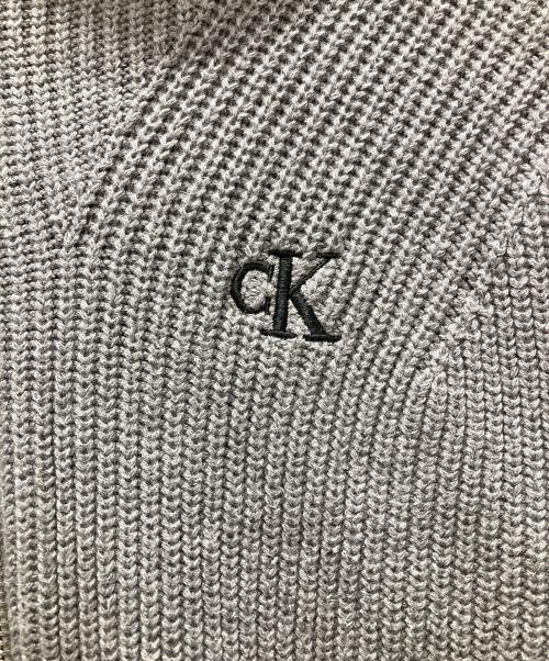 Calvin Klein Jeans（カルバンクラインジーンズ）Calvin Klein Jeans (カルバンクラインジーンズ) ドライバーズニット グレー サイズ:Lの古着・服飾アイテム