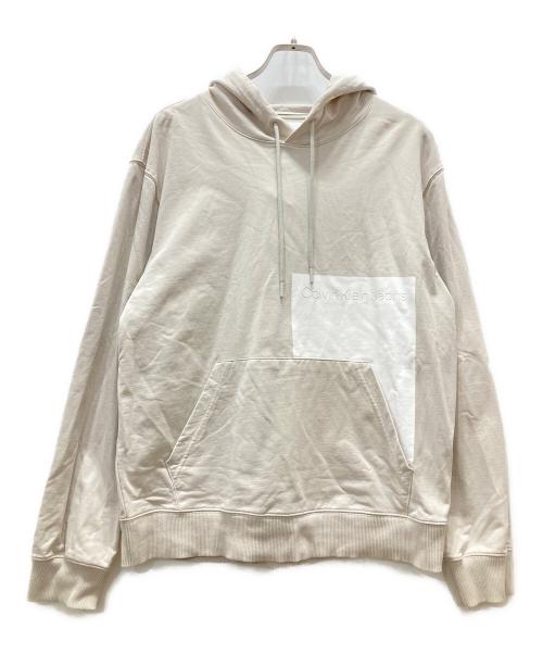 Calvin Klein Jeans（カルバンクラインジーンズ）Calvin Klein Jeans (カルバンクラインジーンズ) プルオーバーパーカー ベージュ サイズ:Mの古着・服飾アイテム