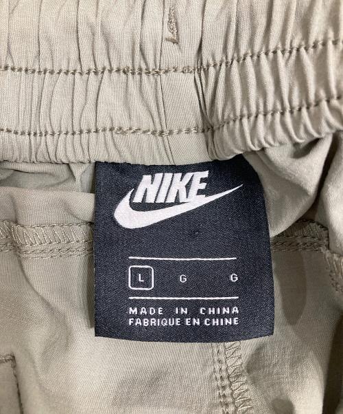 NIKE（ナイキ）NIKE (ナイキ) ナイロンパンツ カーキ サイズ:Lの古着・服飾アイテム