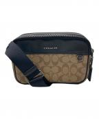 COACHコーチ）の古着「グラハム クロスボディ シグネチャー キャンバス バッグ」｜ブラウン×ブラック