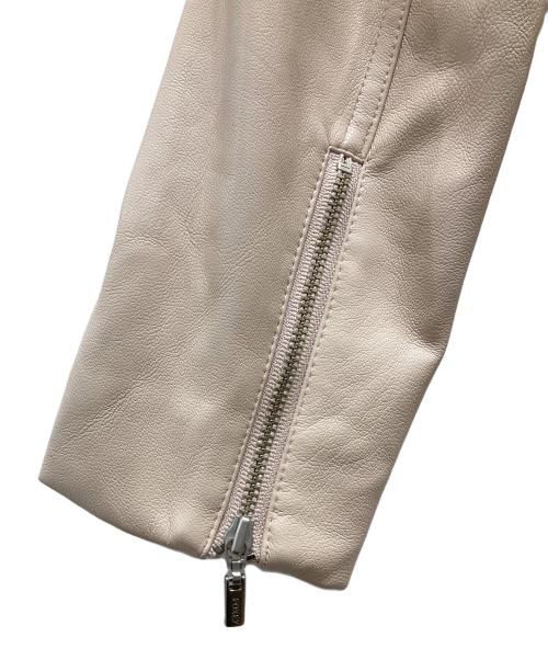 FOXEY NEWYORK（フォクシーニューヨーク）FOXEY NEWYORK (フォクシーニューヨーク) フェイクレザーライダースジャケット ピンク サイズ:38の古着・服飾アイテム