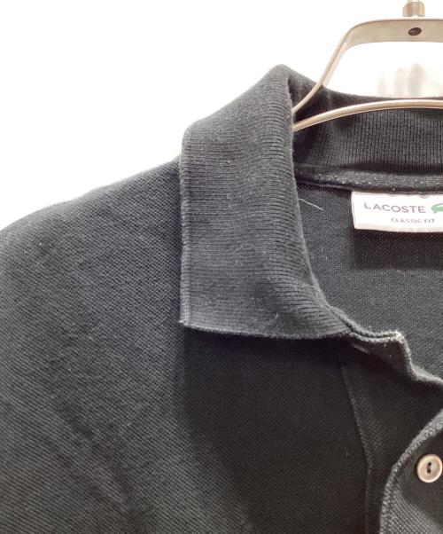 LACOSTE（ラコステ）LACOSTE (ラコステ) ポロシャツ ブラック サイズ:US　Mの古着・服飾アイテム