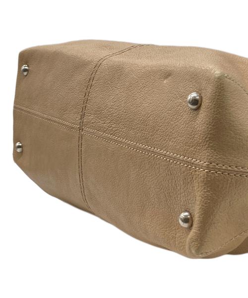 TOD'S（トッズ）TOD'S (トッズ) ハンドバッグ ベージュの古着・服飾アイテム