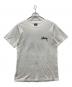 stussy（ステューシー）の古着「LION TRIBE TEE/ロゴプリントTシャツ」｜ホワイト