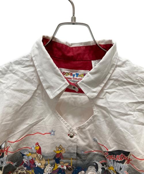 LOONEY TUNES（ルーニーチューンズ）LOONEY TUNES (ルーニーチューンズ) KARMAN (カーマン) キャラプリント ウエスタンシャツ レッド×ホワイト サイズ:Lの古着・服飾アイテム