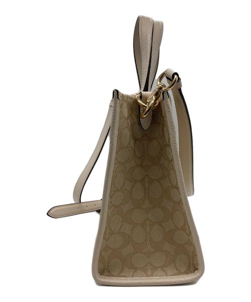 COACH（コーチ）COACH (コーチ) 2WAYバッグ/デンプシー キャリーオール シグネチャー ベージュの古着・服飾アイテム
