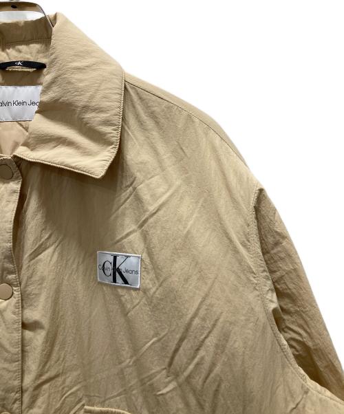 Calvin Klein Jeans（カルバンクラインジーンズ）Calvin Klein Jeans (カルバンクラインジーンズ) ロゴワッペン中綿ジャケット ブラウン サイズ:Mの古着・服飾アイテム