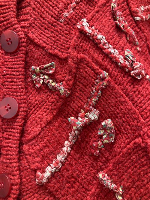 I.S. ISSEY MIYAKE（イッセイ ミヤケ）i.s. ISSEY MIYAKE (イッセイ ミヤケ) リボン ニットカーディガン レッド サイズ:Mの古着・服飾アイテム