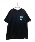 stussyステューシー）の古着「フラワーグラフィックTシャツ」｜ブラック