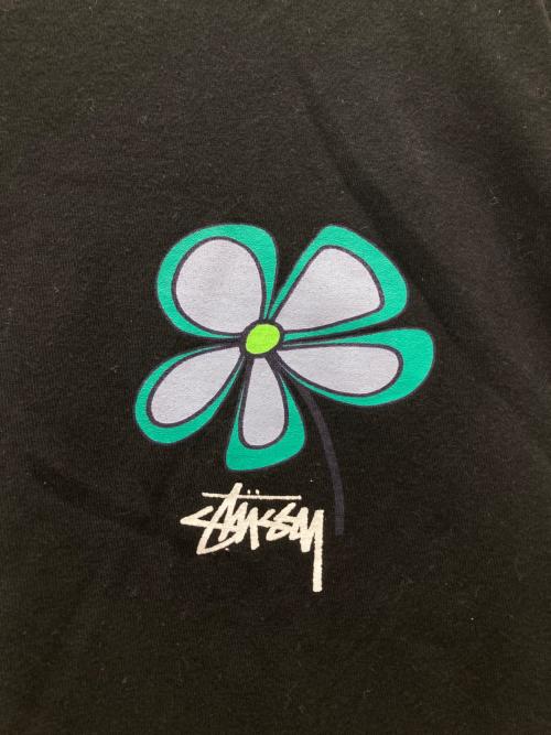 stussy（ステューシー）stussy (ステューシー) フラワーグラフィックTシャツ ブラック サイズ:Lの古着・服飾アイテム