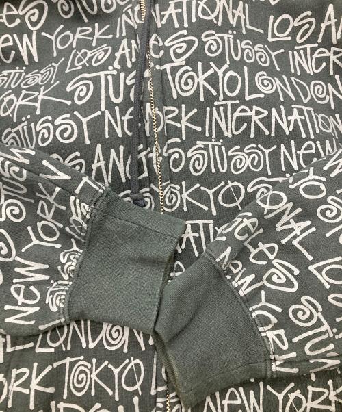 stussy（ステューシー）stussy (ステューシー) 総柄ロゴジップパーカー ブラック サイズ:Sの古着・服飾アイテム